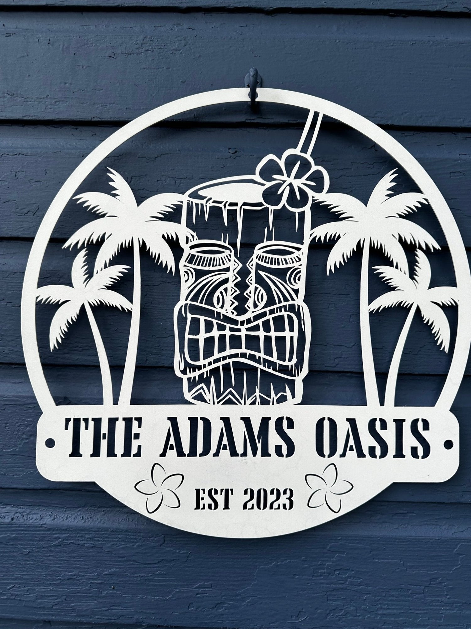 Personalized Tiki Bar Sign hanging on a wall