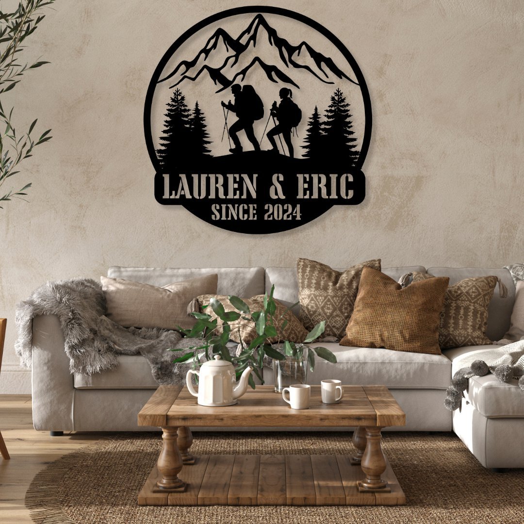 Gifts for Hikers - Mountain and Trail inspired decor - a personalized metal sign with two hikers hangs on the wall