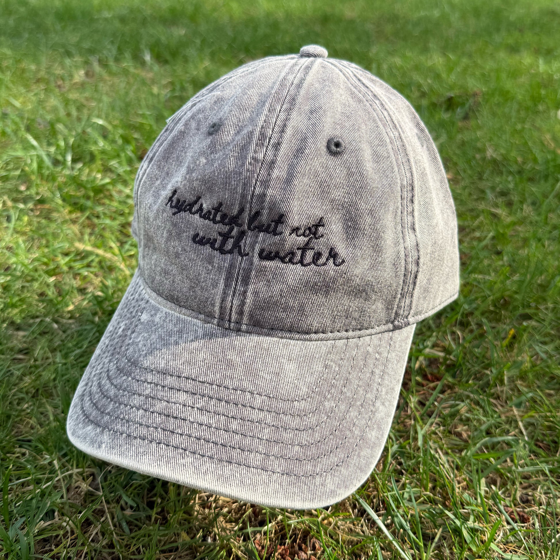 "Hydrated but not with water" - Funny Travel Hat for Beach Lovers - to side