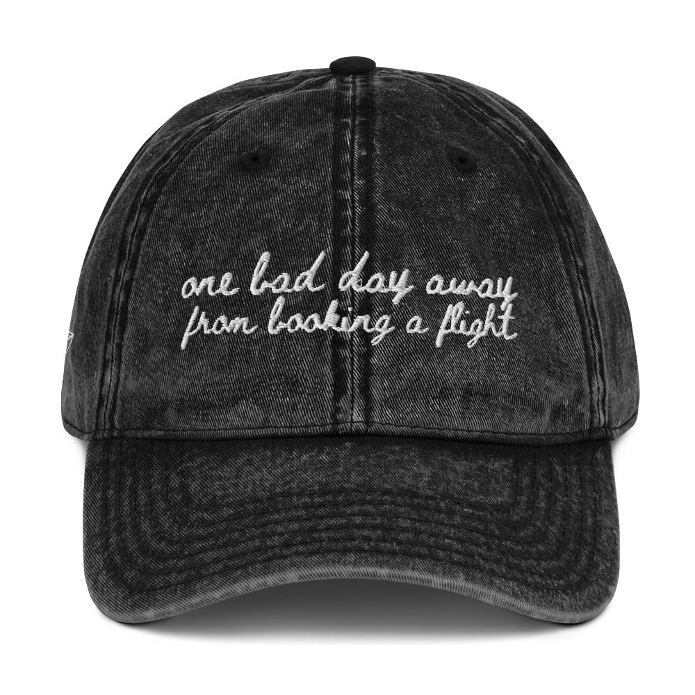 "One bad day away from booking a flight" Funny hat for travel lovers - mock up
